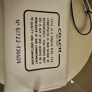 Coach Cream Leather Wristlet with Black Accents